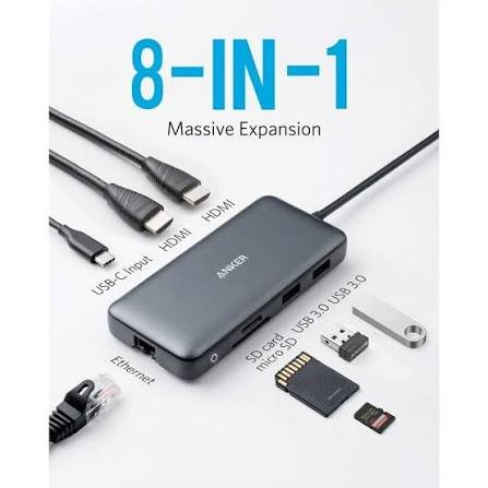 USB-C to HDMI adapter connecting a MacBook Air to an external monitor